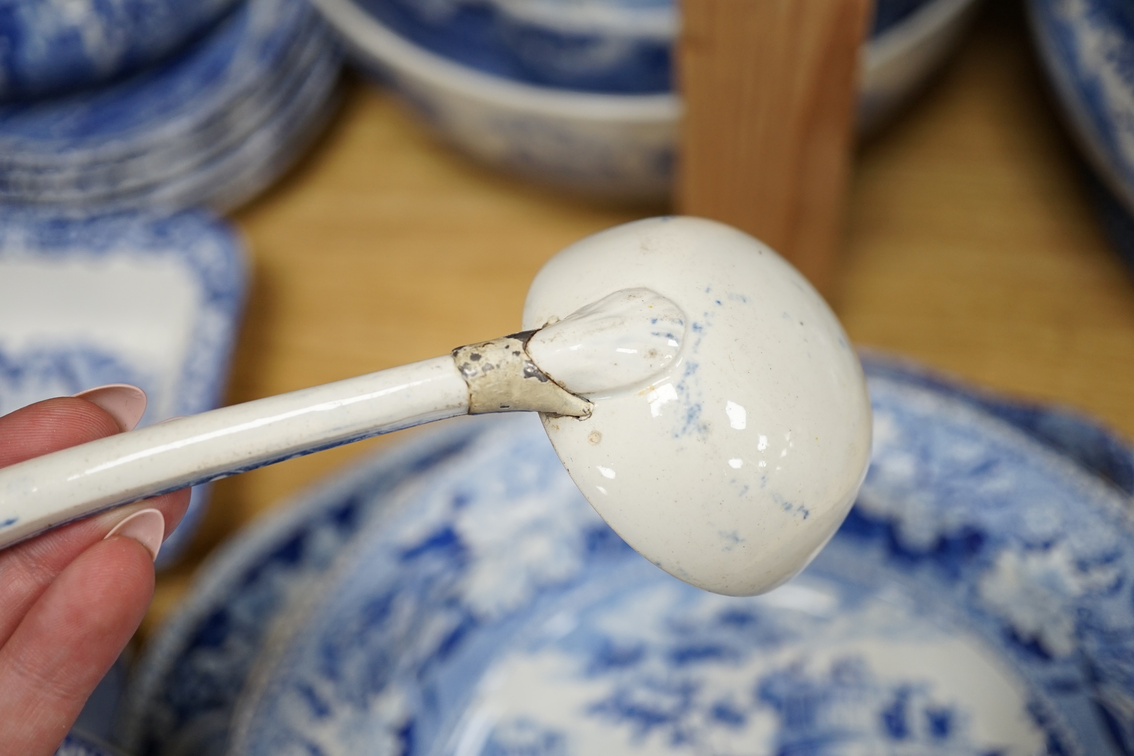A collection of blue and white Spode Italian dinnerware to include mugs, plates and lidded tureen, largest 37cm wide. Condition - poor to fair